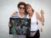 Romero Britto and Lindsey Matheson with Bubbles the Chimp's Painting